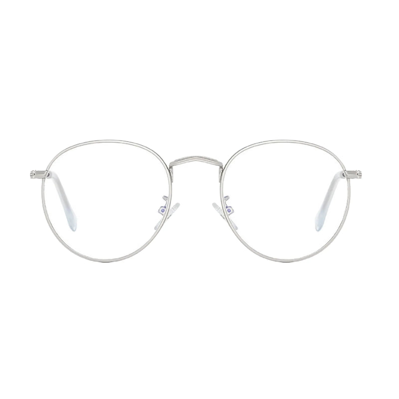 Blue Light Glasses Milan Silver frame, elegant and lightweight round design. Reduces blue light exposure, eye strain and improves sleep. Ideal for extended screen use on laptops, tablets, and phones. Comfortable nose pads and durable metal finish. www.zenluk.com