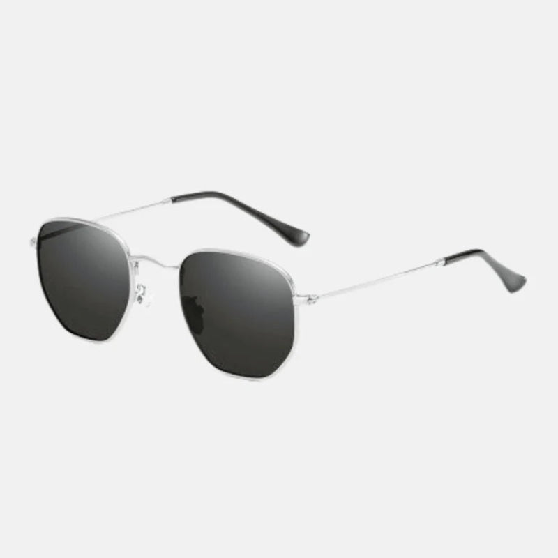 Sunglasses Laura Silver – Elegant silver sunglasses featuring thin metallic temples, dark square-shaped lenses with a soft rounded contour, UV protection, adjustable silicone nose pads, and sleek black temple tips for a refined look. Discover more at www.zenluk.com