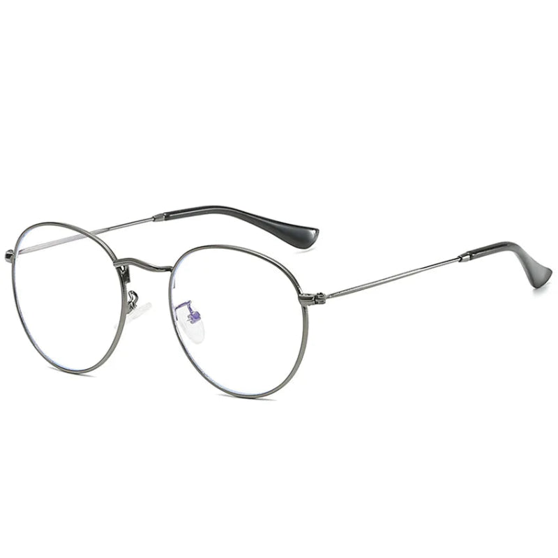 Side Blue Light Glasses Milan Grey frame, elegant and lightweight round design. Reduces blue light exposure, eye strain and improves sleep. Ideal for extended screen use on laptops, tablets, and phones. Comfortable nose pads and durable metal finish. www.zenluk.com
