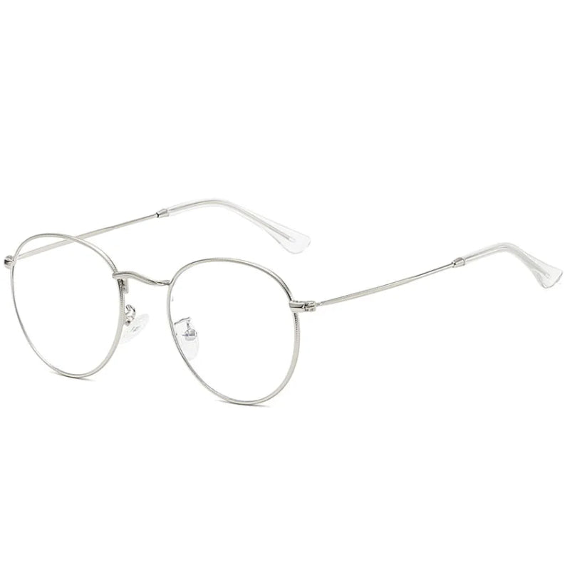 Side Blue Light Glasses Milan Silver frame, elegant and lightweight round design. Reduces blue light exposure, eye strain and improves sleep. Ideal for extended screen use on laptops, tablets, and phones. Comfortable nose pads and durable metal finish. www.zenluk.com