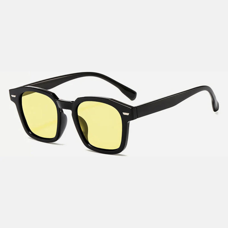 Sunglasses Noir Black – Yellow lens Rectangular sunglasses with slightly rounded edges, UV-protected lenses, discreet metallic detail near the hinges, and long, gently curved temples for comfort. Discover more at www.zenluk.com