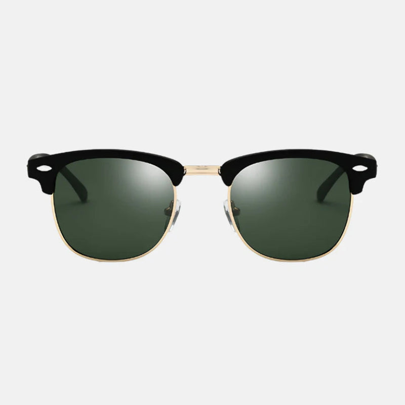 Sunglasses Ruby Black-Green – Classic half-frame sunglasses with a sleek black acetate upper, gold metal rim, and bridge, featuring dark green polarized lenses. The temples match the black acetate with silver rivet accents, while the gold metal details add a refined touch. Perfect for a timeless and versatile look. Discover more at www.zenluk.com.