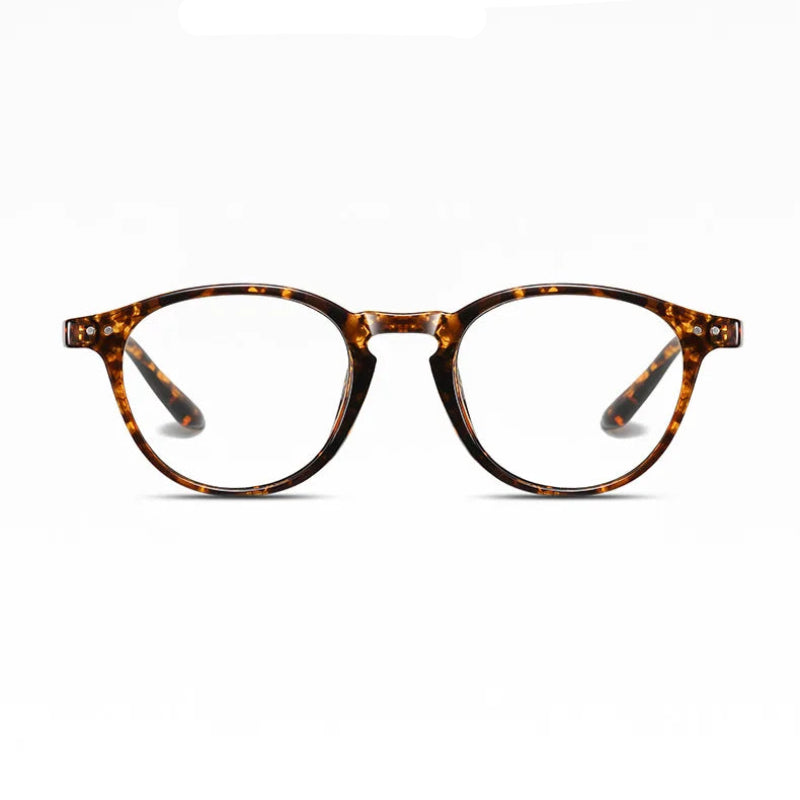 Blue Light Glasses Retro Leopard frame, round lenses, and modern minimalistic design. Built for everyday use, these glasses filter harmful blue light to reduce eye strain, improve focus, and support better sleep quality. Lightweight and durable with a comfortable fit, perfect for long hours at the office, on your phone, or during late-night screen time. A timeless choice for both men and women. Available now at www.zenluk.com