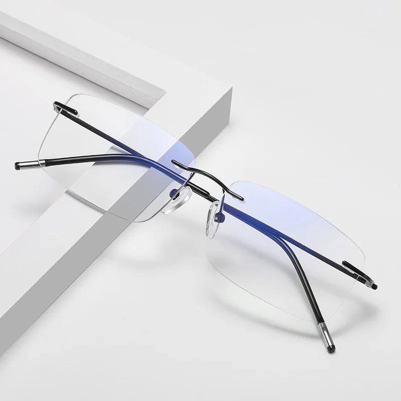 Blue Light Glasses Zyon with matte black frame, rounded rectangular lenses, and clean modern lines. Designed to block blue light and reduce digital eye strain, these glasses help protect your vision and support restful sleep during extended screen use. Ultra-lightweight and comfortable for all-day wear, with flexible arms and a unisex fit that suits any face shape. Ideal for work, study, or casual wear. Available now at www.zenluk.com